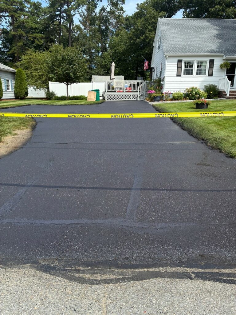 Overgrown Billerica Massachusetts Driveway Restored and Sealed